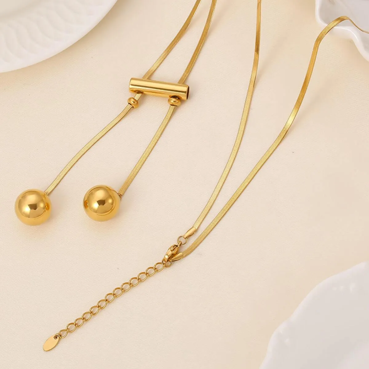 Golden Beauty: 18K Plated Titanium Hollow Bead Necklace