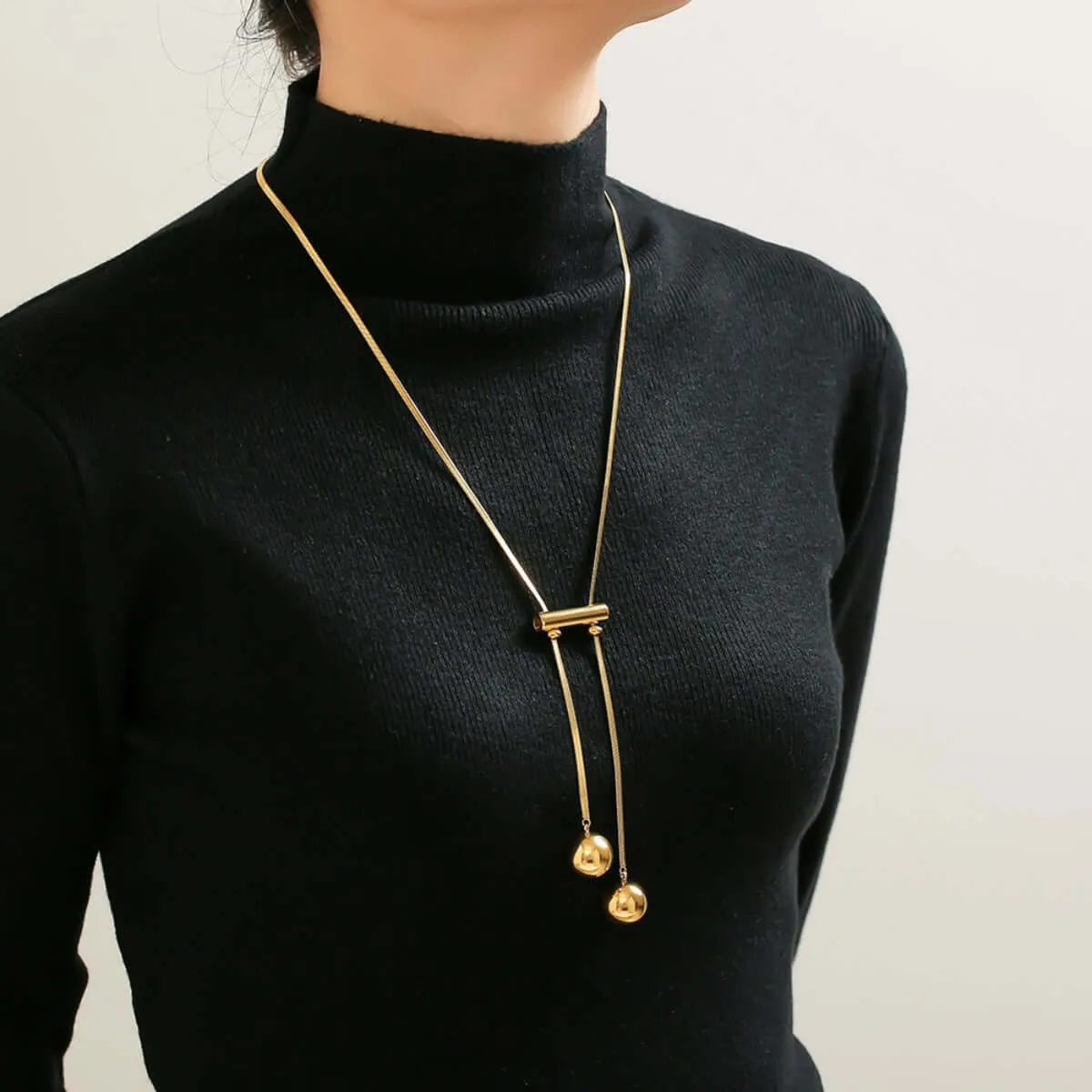 Golden Beauty: 18K Plated Titanium Hollow Bead Necklace