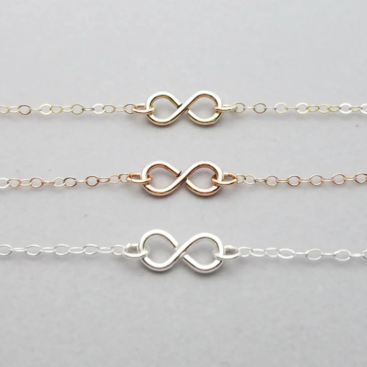 Infinity Necklace in Sterling Rose and Yellow Gold